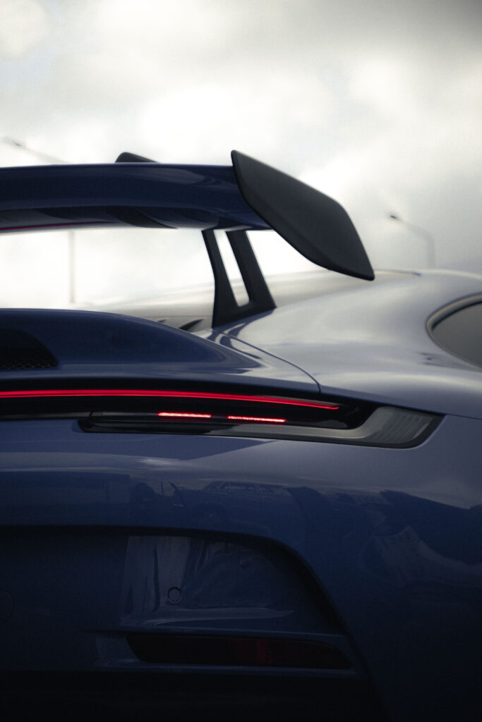 Porshe 911, fotografia szczegółu i motoryzacyjna