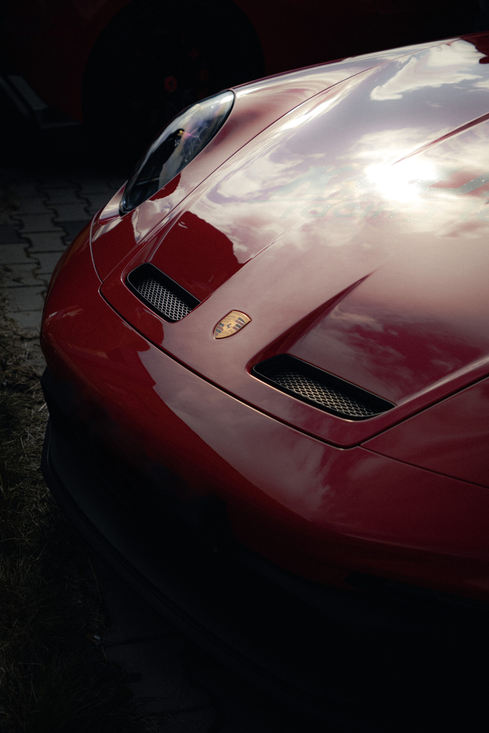 Porshe 911, fotografia szczegółu i motoryzacyjna